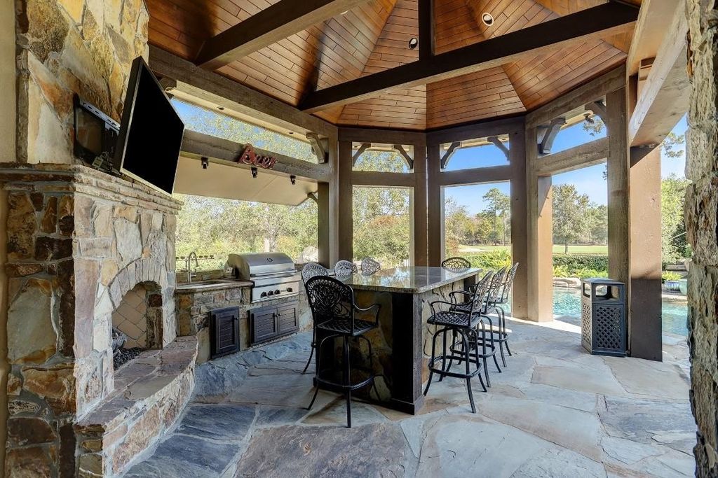 Resort style home showcasing breathtaking views of jack nicklaus signature golf course in the woodlands texas listed for 4. 8 million 45