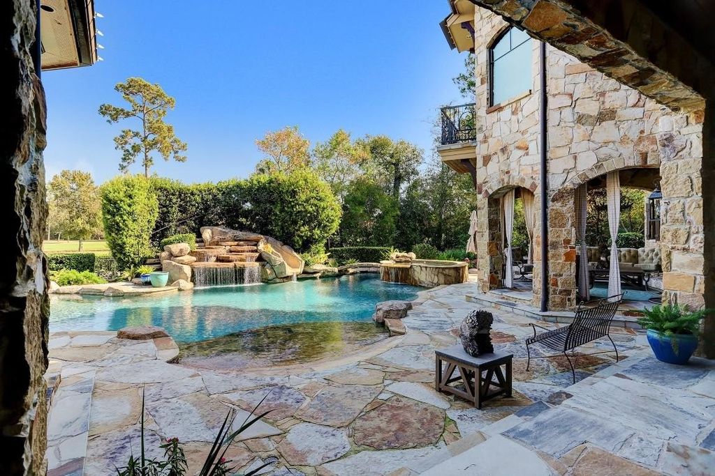 Resort style home showcasing breathtaking views of jack nicklaus signature golf course in the woodlands texas listed for 4. 8 million 47