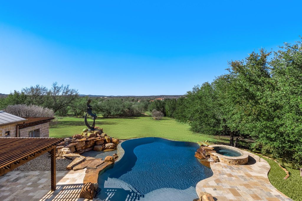 Secluded elegance in spicewood a tranquil haven for elegant living and captivating entertaining listed at 3. 295 million 31