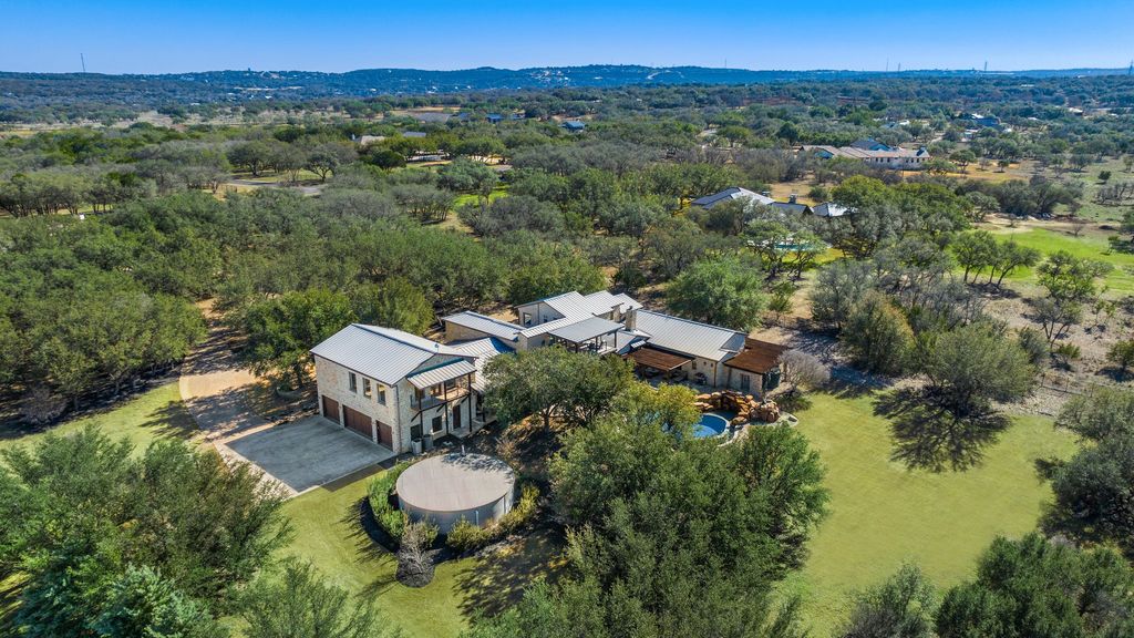 Secluded elegance in spicewood a tranquil haven for elegant living and captivating entertaining listed at 3. 295 million 35