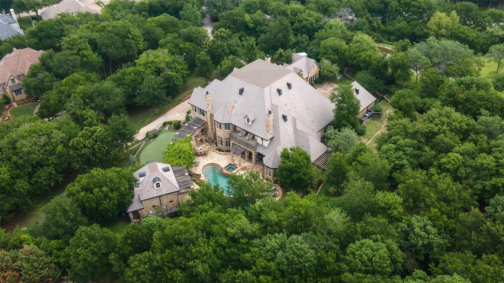 Sophisticated fort worth estate effortless entertaining on 2. 22 acres in gated mira vista a masterpiece of design listed at 4. 495 million 33