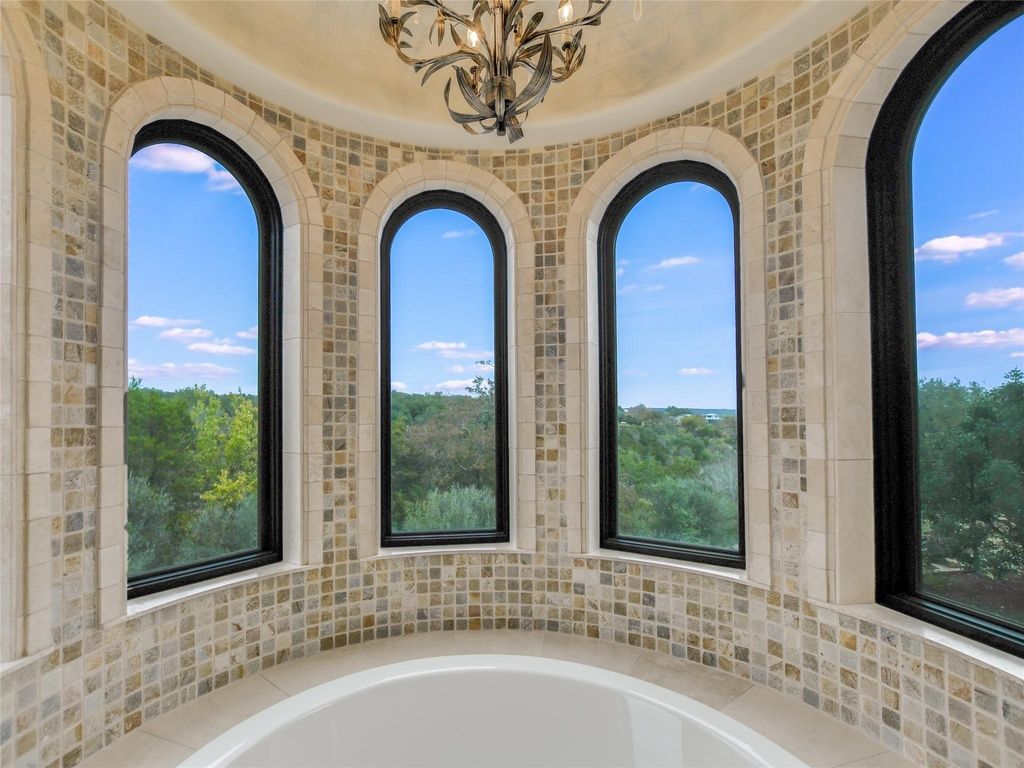 Spicewood waterfront luxury private estate with golf course views in barton creek lakeside offered at 3. 175 million 25