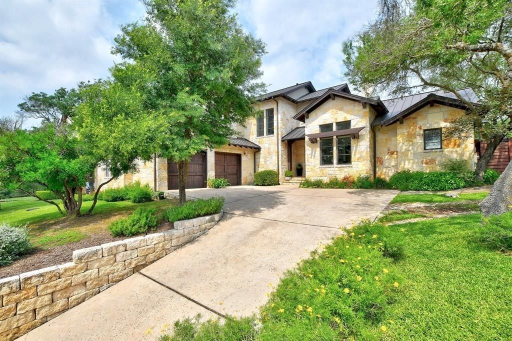 Stunning home in austin with abundant natural light and breathtaking backyard views priced at 2. 495 million 2