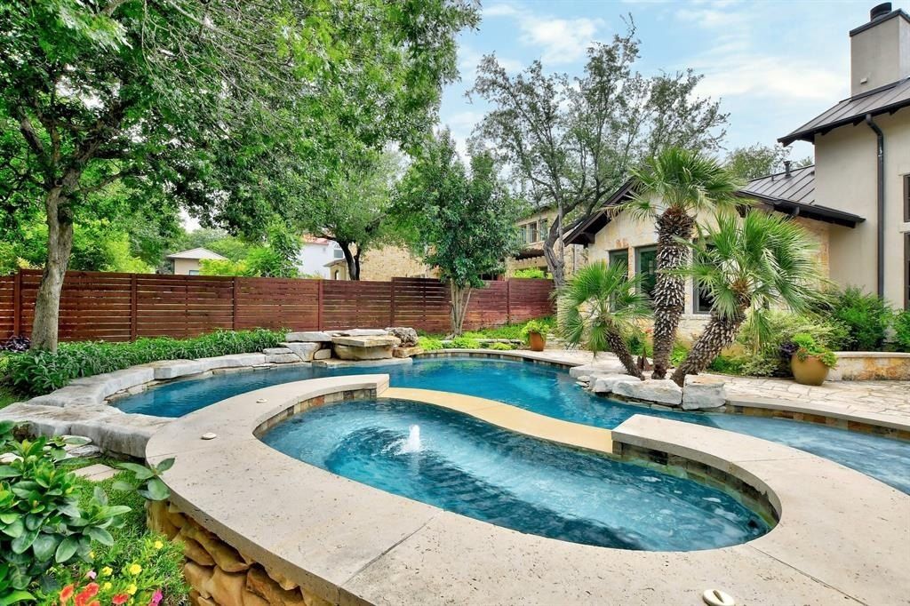 Stunning home in austin with abundant natural light and breathtaking backyard views priced at 2. 495 million 35