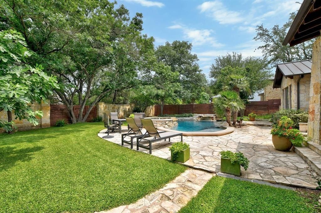 Stunning home in austin with abundant natural light and breathtaking backyard views priced at 2. 495 million 36