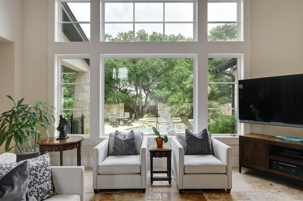 Stunning home in austin with abundant natural light and breathtaking backyard views priced at 2. 495 million 9