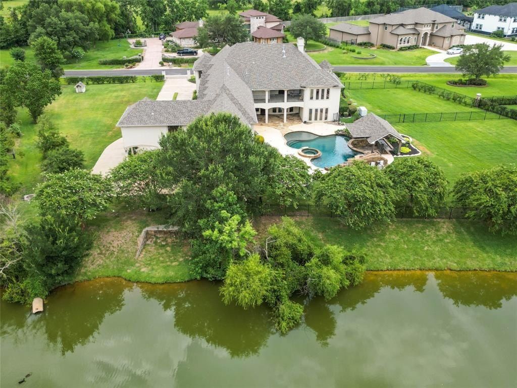 Stunning home with exceptional outdoor living space listed at 2. 2 million in spring texas 7