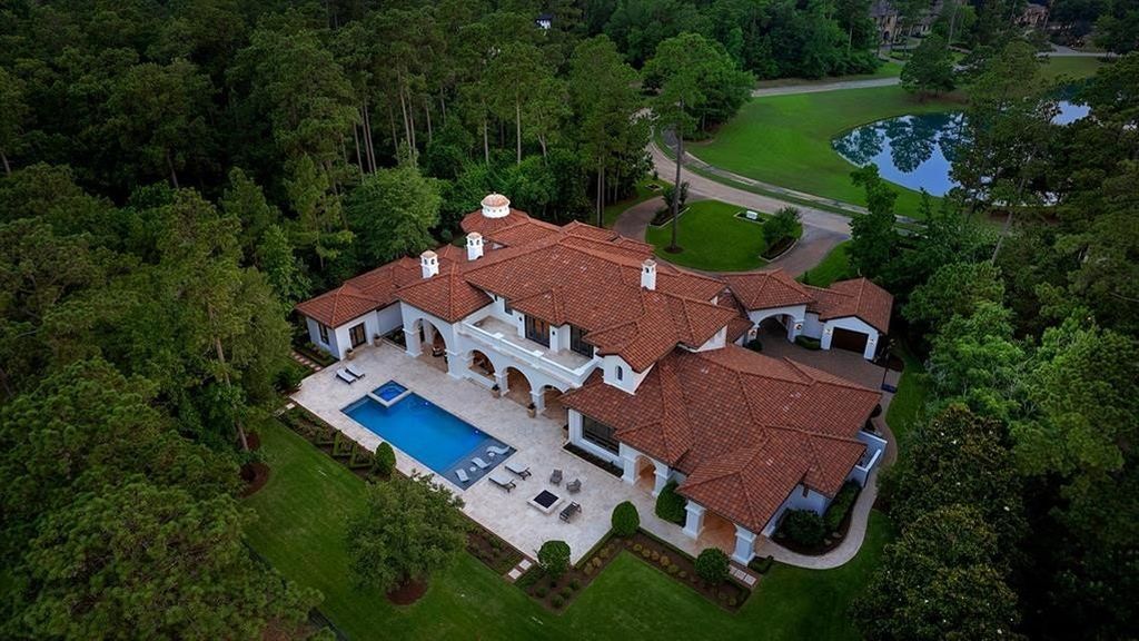 Stunning home with serene pond and golf course views in the woodlands texas listed at 5. 35 million 49