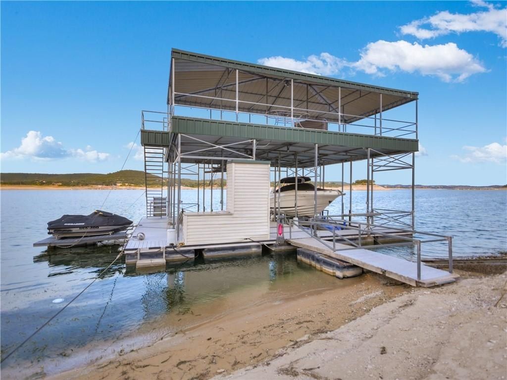 Stunning jauregui designed estate in the peninsula on north lake shore lake travis jonestown listed at 6. 99 million 35