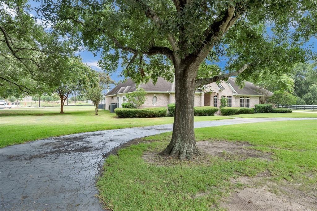 Tranquil 2. 25 acre unrestricted oasis custom built home prime investment in katy texas priced at 2 million 2