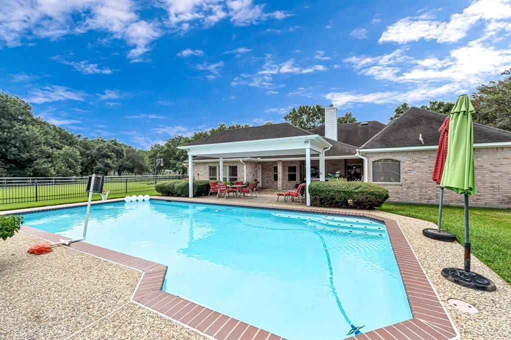 Tranquil 2. 25 acre unrestricted oasis custom built home prime investment in katy texas priced at 2 million 36