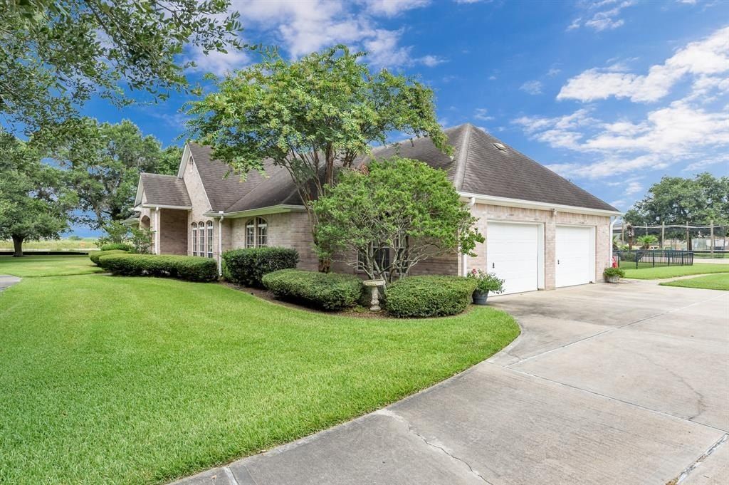 Tranquil 2. 25 acre unrestricted oasis custom built home prime investment in katy texas priced at 2 million 5