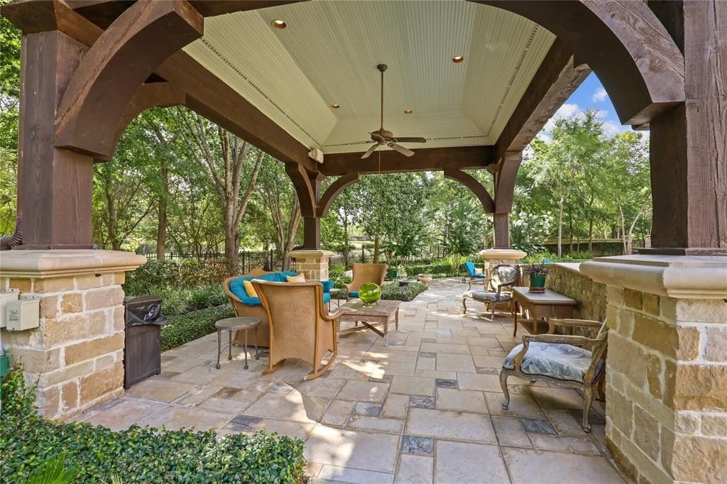 Tranquil oasis resort style pool and lush landscaping offer serenity in the woodlands texas asking for 5. 95 million 14