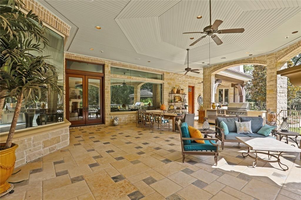 Tranquil oasis resort style pool and lush landscaping offer serenity in the woodlands texas asking for 5. 95 million 22