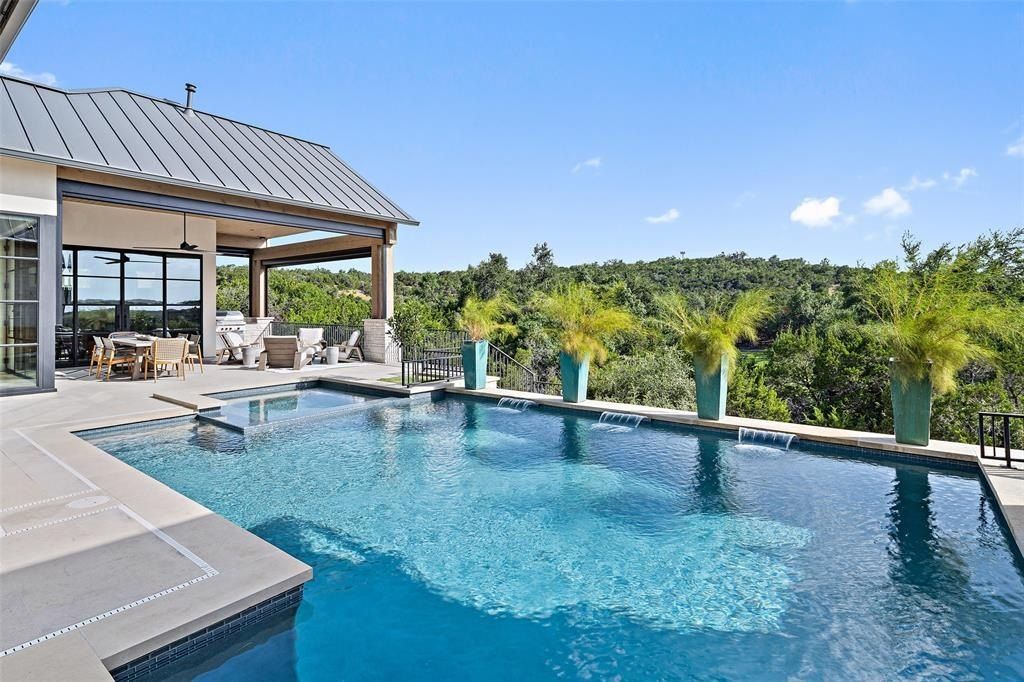 Ultimate austin luxury expansive 1. 06 acre property boasting superb outdoor living and sweeping hilltop views listed at 4. 525 million 23
