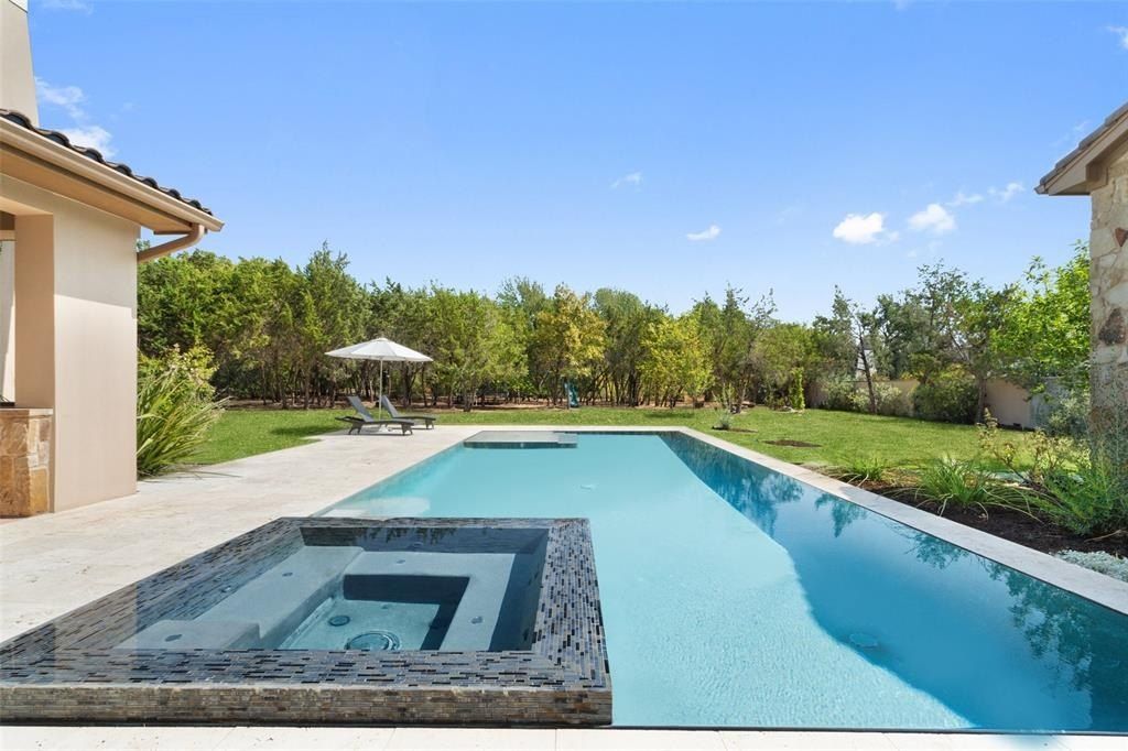 Exquisite austin texas home seamlessly blending indoor and outdoor living on a sprawling 1 acre lot priced at 4. 495 million 36