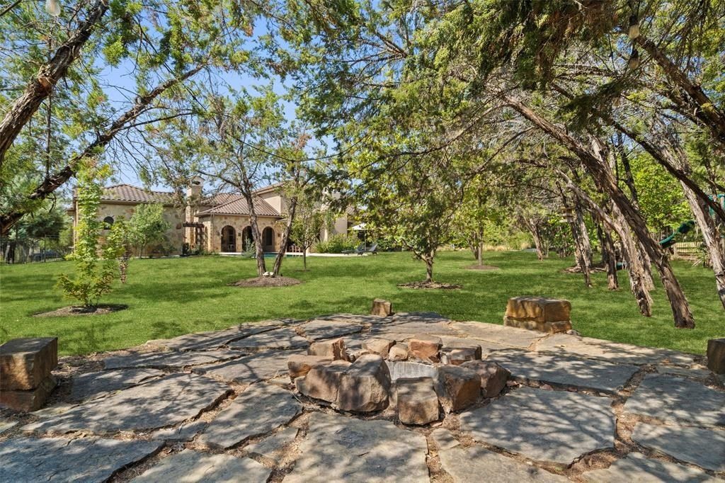 Exquisite austin texas home seamlessly blending indoor and outdoor living on a sprawling 1 acre lot priced at 4. 495 million 37