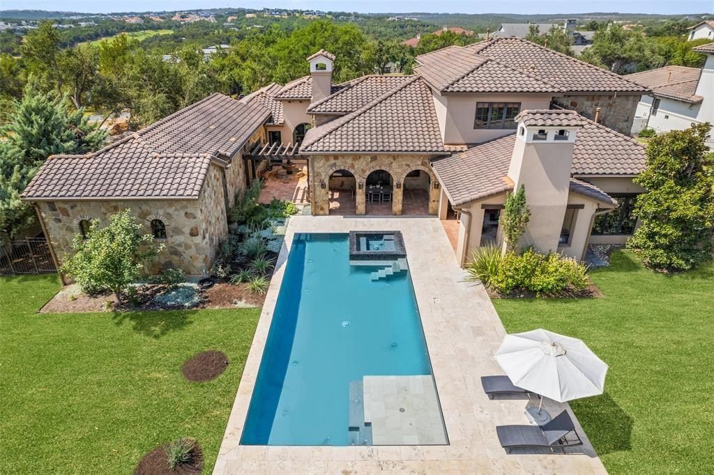 Exquisite austin texas home seamlessly blending indoor and outdoor living on a sprawling 1 acre lot priced at 4. 495 million 38