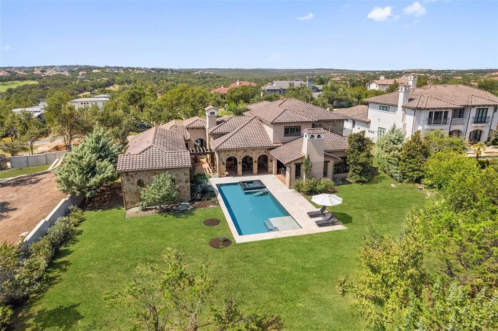 Exquisite austin texas home seamlessly blending indoor and outdoor living on a sprawling 1 acre lot priced at 4. 495 million 39