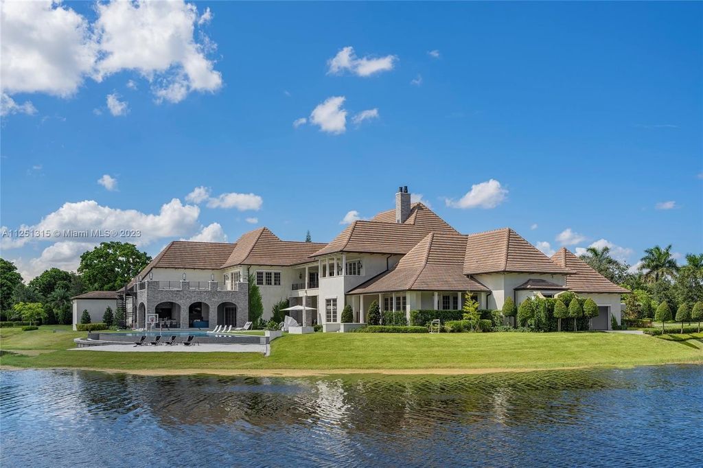 Luxurious 11 acre estate with twin french country mansions and private lake in fort lauderdale florida listed at 47 million 83
