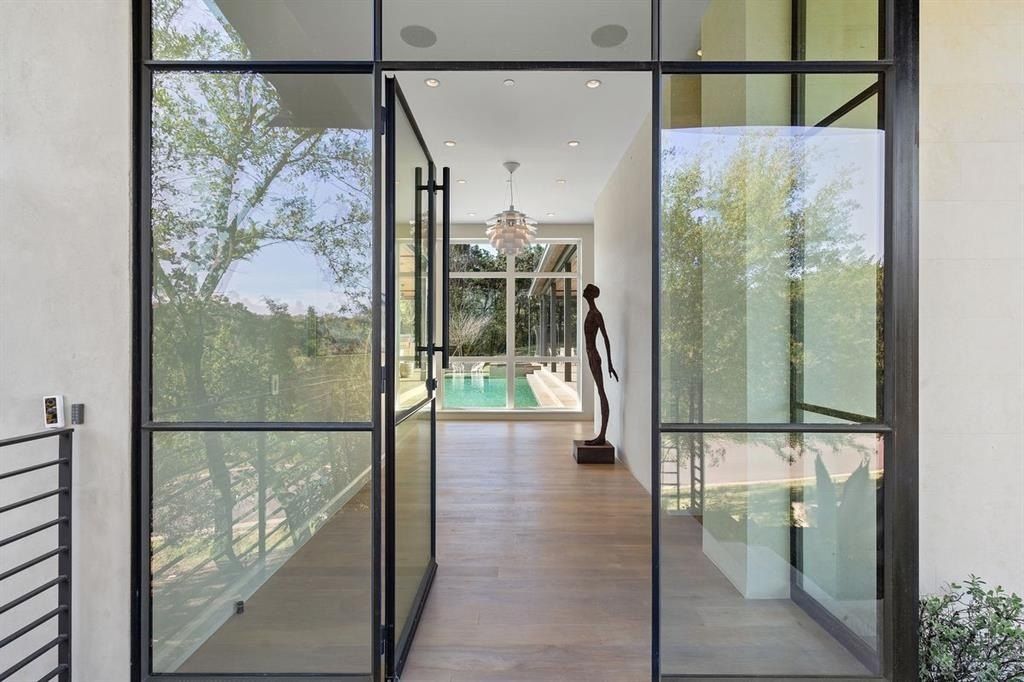 Modern contemporary oasis in austin texas showcases pool and expansive outdoor living space listed at 6. 9 million 18