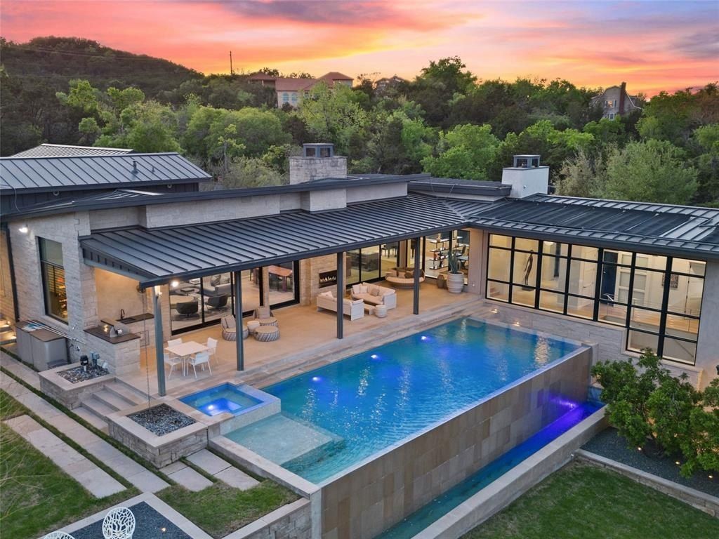 Modern contemporary oasis in austin texas showcases pool and expansive outdoor living space listed at 6. 9 million 2