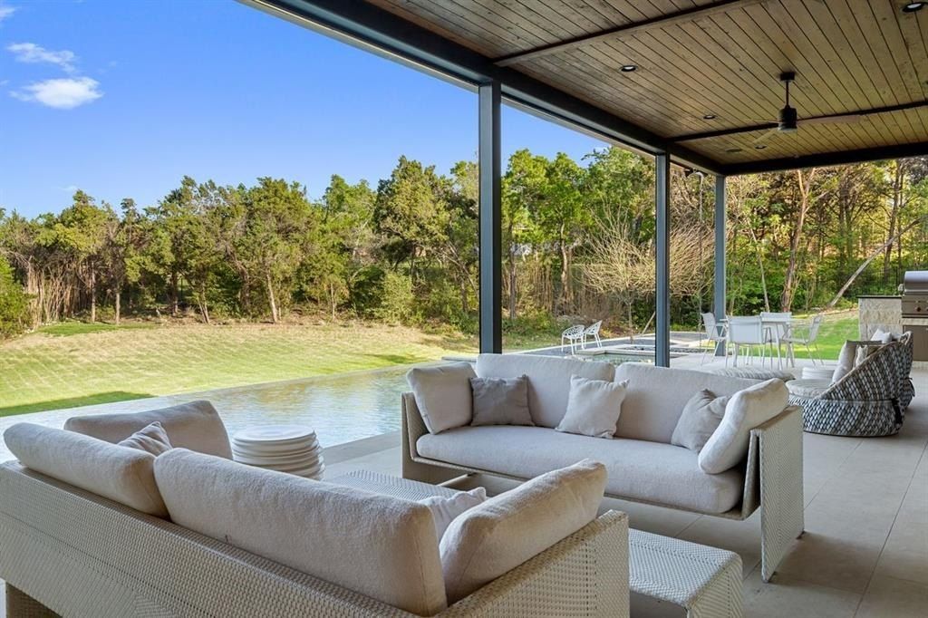 Modern contemporary oasis in austin texas showcases pool and expansive outdoor living space listed at 6. 9 million 25