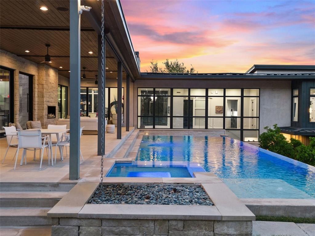 Modern contemporary oasis in austin texas showcases pool and expansive outdoor living space listed at 6. 9 million 4