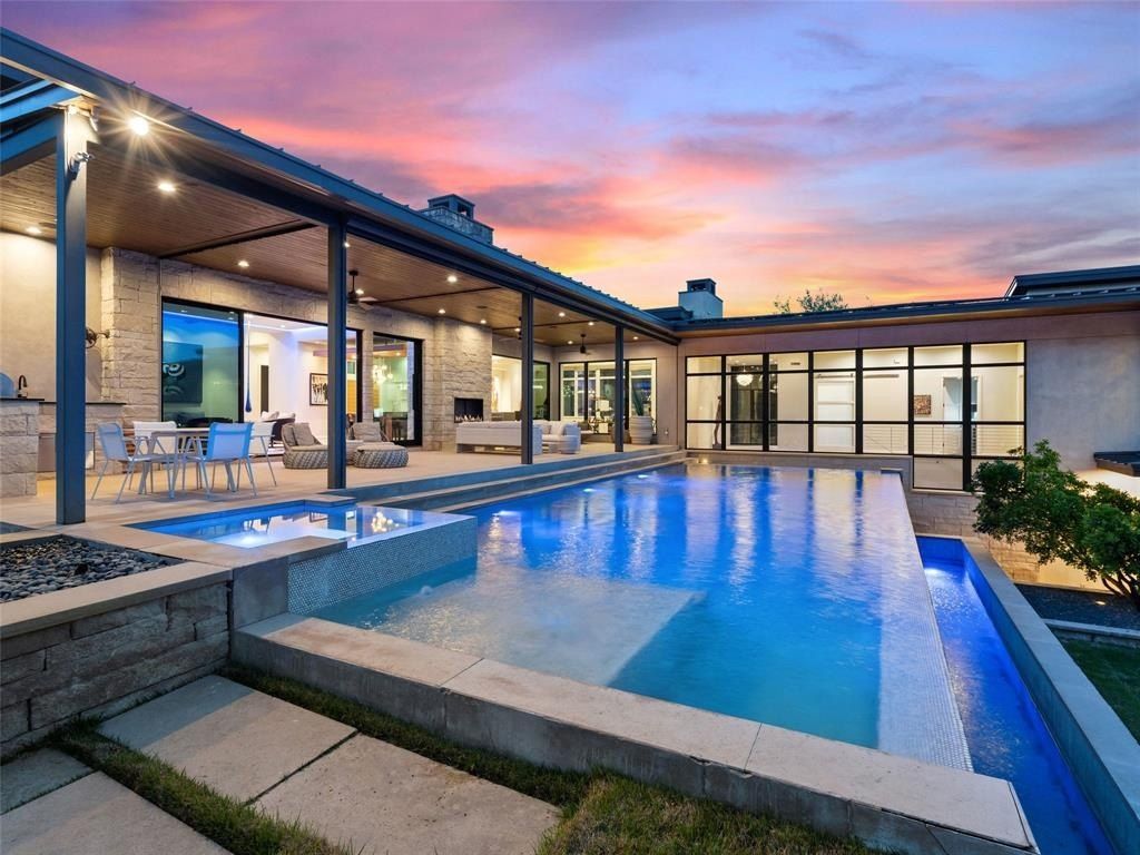 Modern contemporary oasis in austin texas showcases pool and expansive outdoor living space listed at 6. 9 million 5