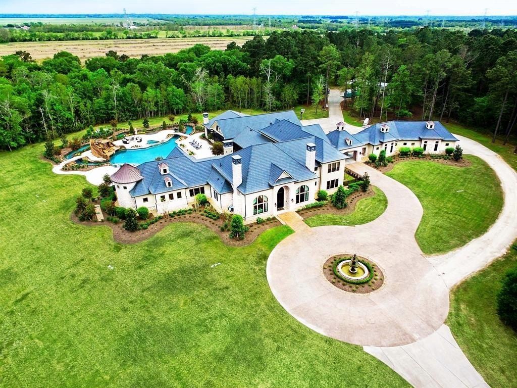 Stunning custom estate in crosby texas featuring a breathtaking freeform pool with meandering lazy river 1