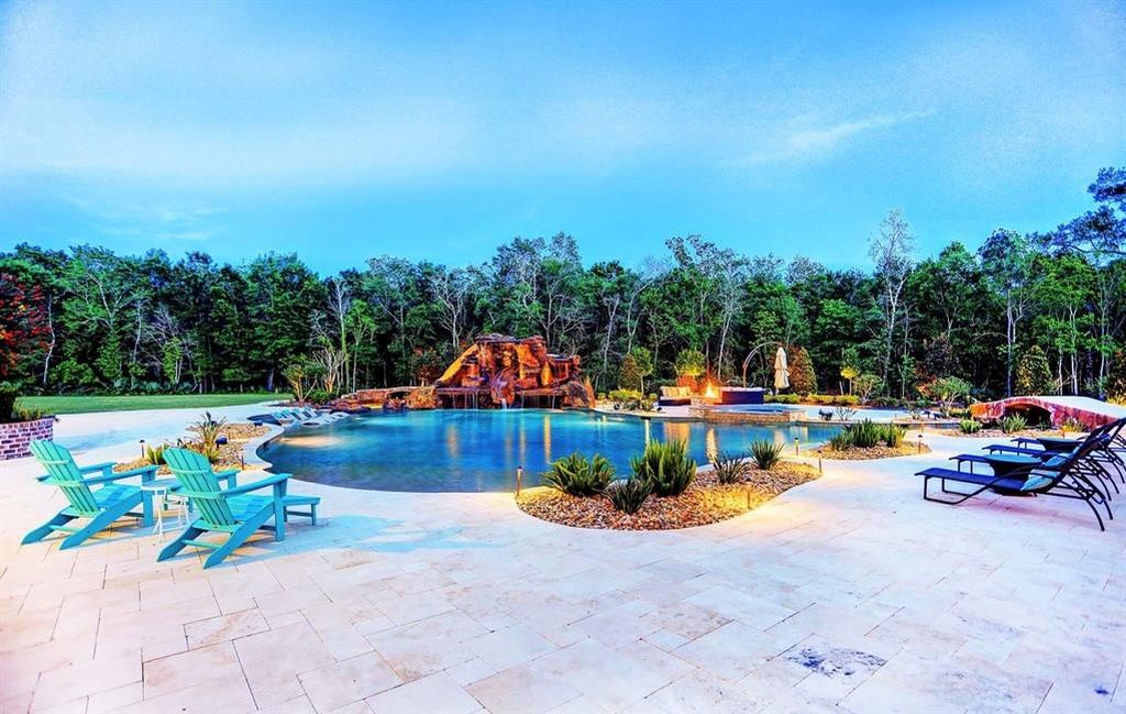 Stunning custom estate in crosby texas featuring a breathtaking freeform pool with meandering lazy river 43