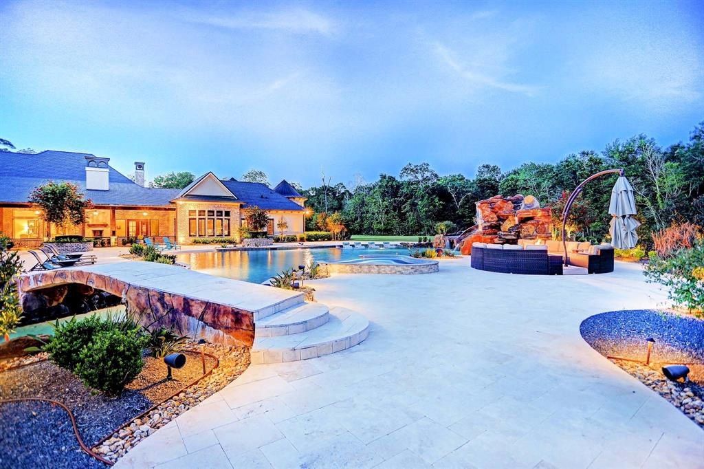 Stunning custom estate in crosby texas featuring a breathtaking freeform pool with meandering lazy river 44