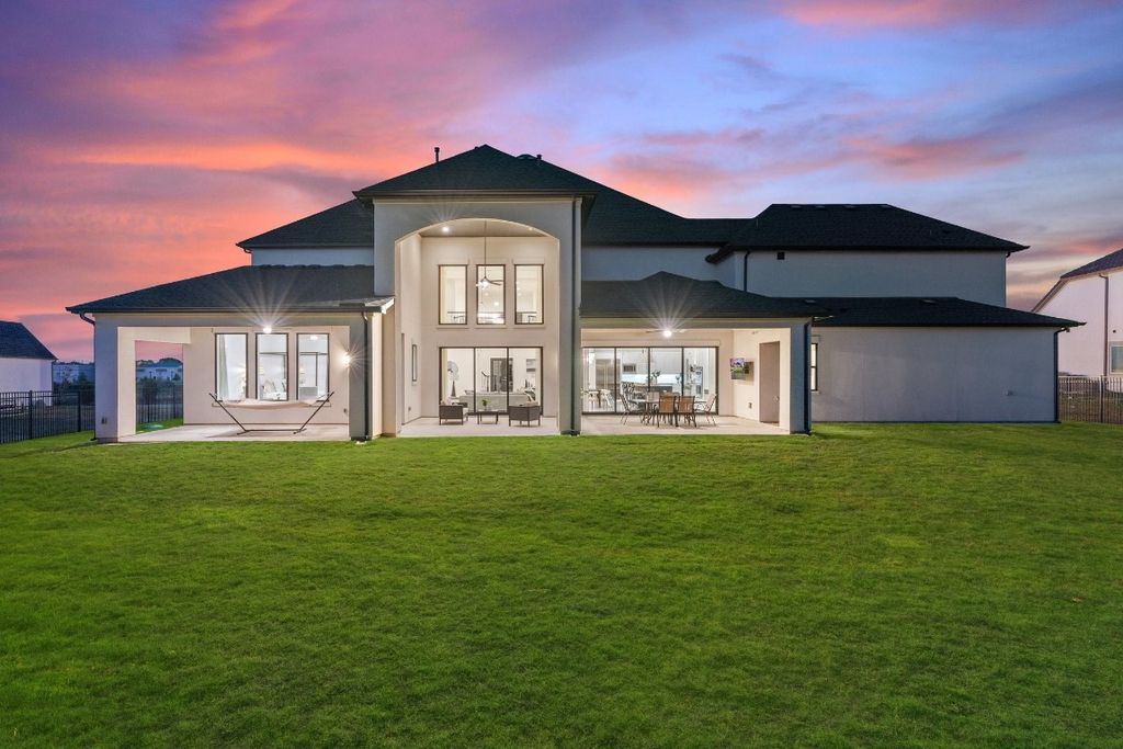 Elegantly melded modern and classic design in flower mound home priced at 2. 499 million 34