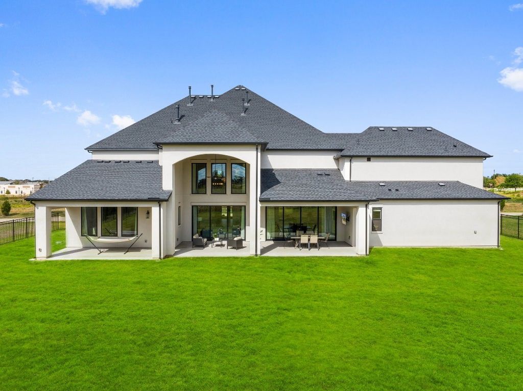 Elegantly melded modern and classic design in flower mound home priced at 2. 499 million 37