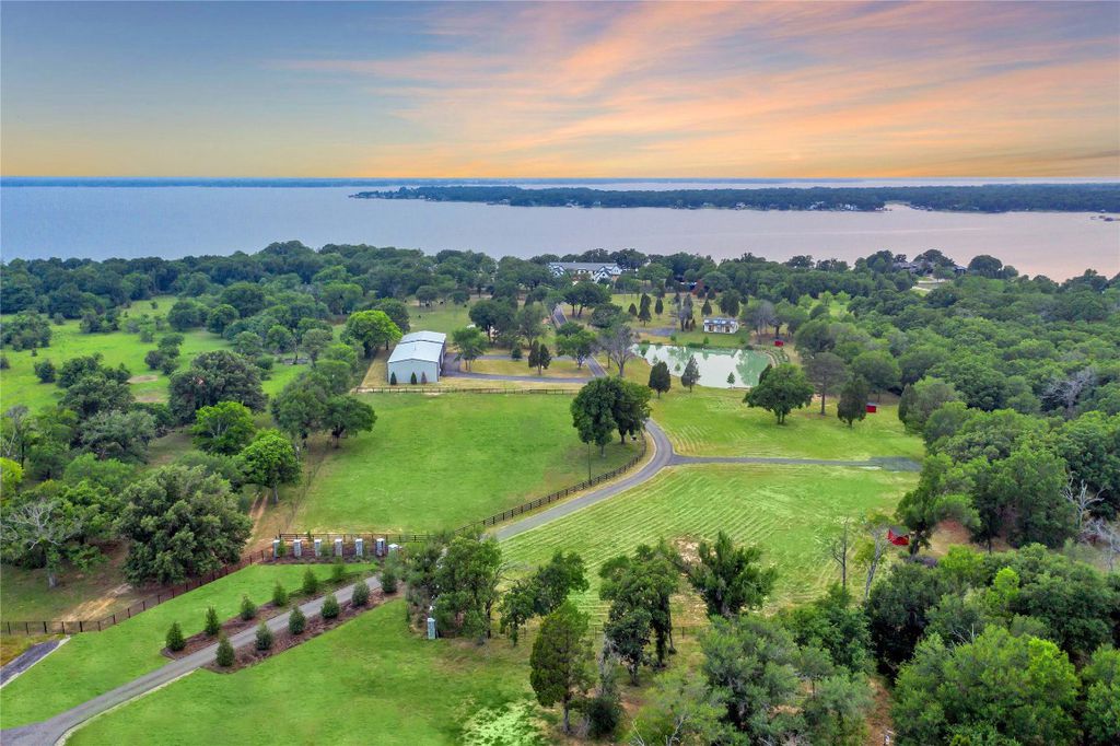 Masterful malakoff estate serene lake views seamless indoor outdoor living for 25 million 38