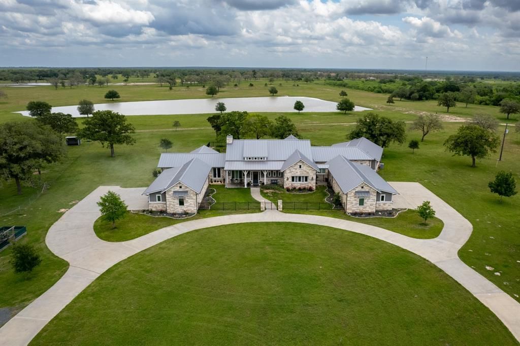 Gorgeous Custom Home with 175 Acres and Pond in Smithville for $6.4 Million