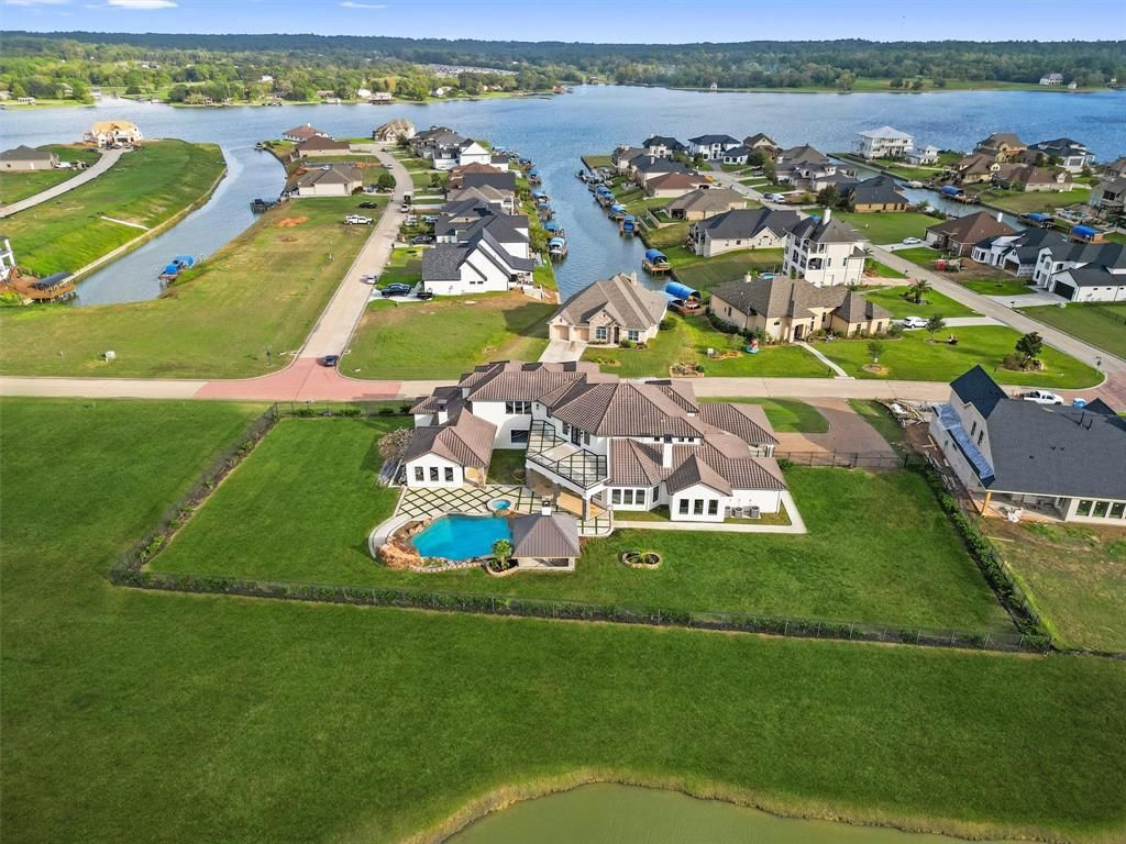 Stunning 2 story home overlooking lake conroe in willis offered at 2. 6 million 4