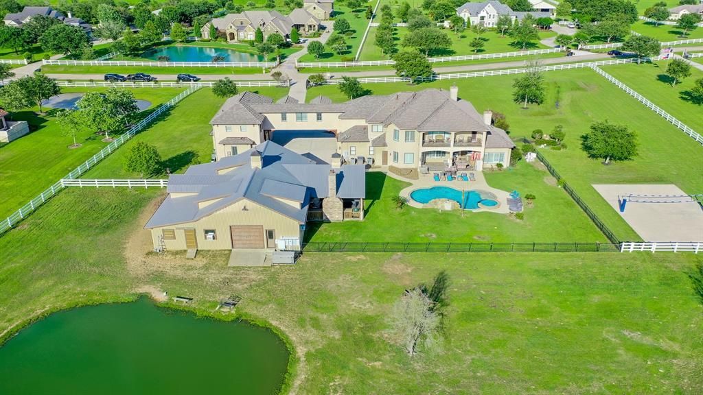 3. 18 acre equestrian oasis with main residence and unmatched amenities in cypress asking 2. 599 million 2