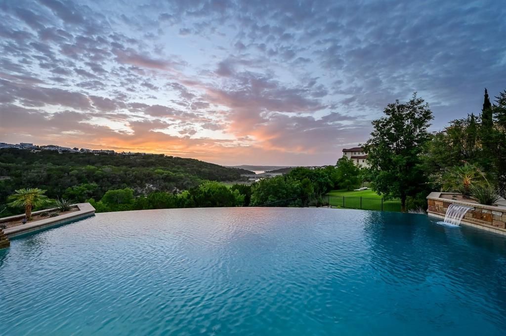A architectural marvel overlooking lake travis with resort style amenities priced at 3. 1 million 12 result