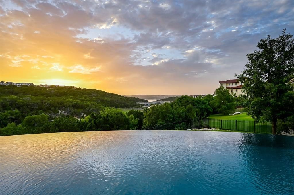 A architectural marvel overlooking lake travis with resort style amenities priced at 3. 1 million 2 result