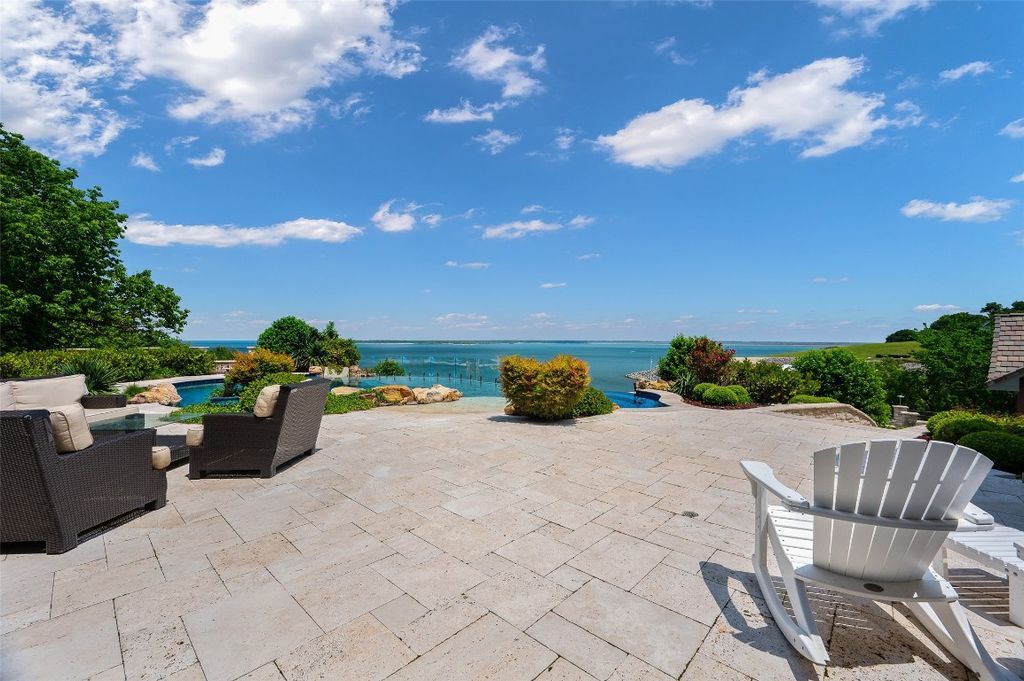 A captivating lakefront estate with infinity pool helipad and unmatched views listed at 10. 9 million 38