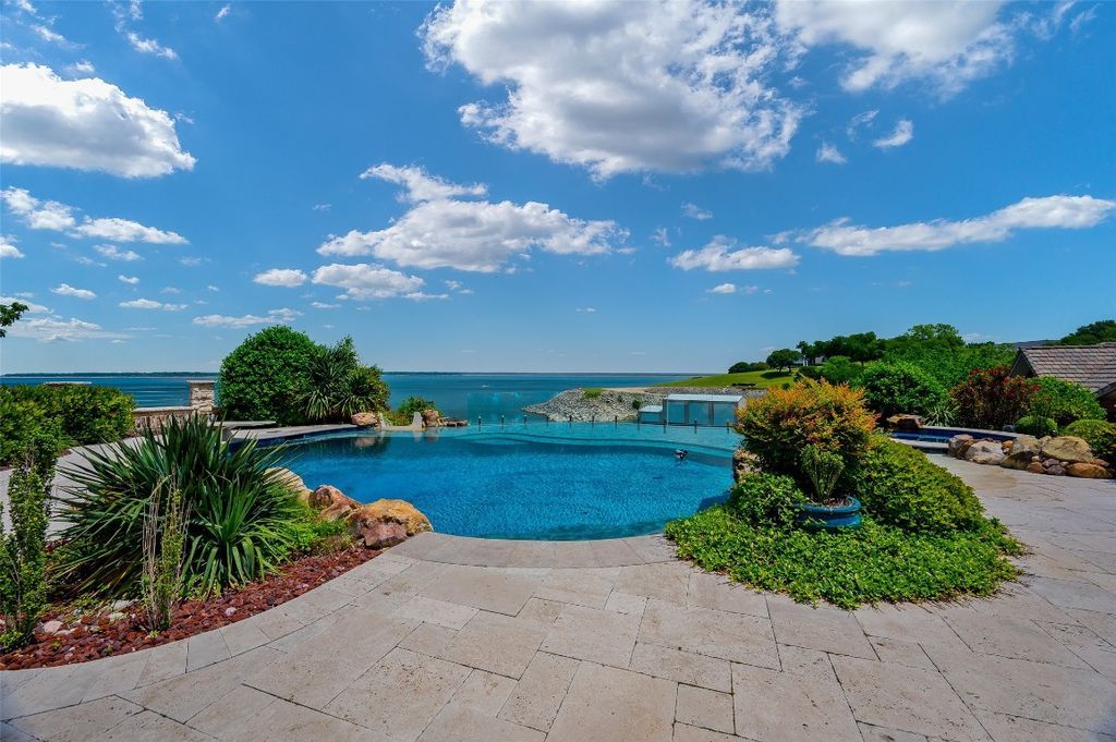 A captivating lakefront estate with infinity pool helipad and unmatched views listed at 10. 9 million 39
