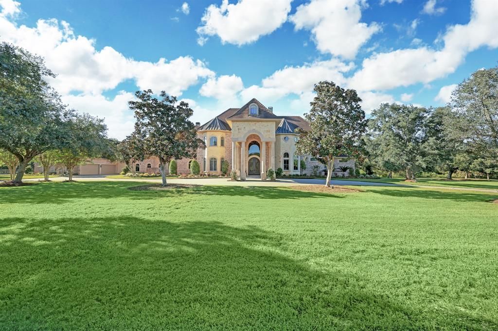 Acreage lifestyle meets city convenience in fresnos exquisite home listed at 3. 499 million 3