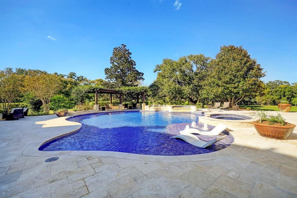 Acreage lifestyle meets city convenience in fresnos exquisite home listed at 3. 499 million 45