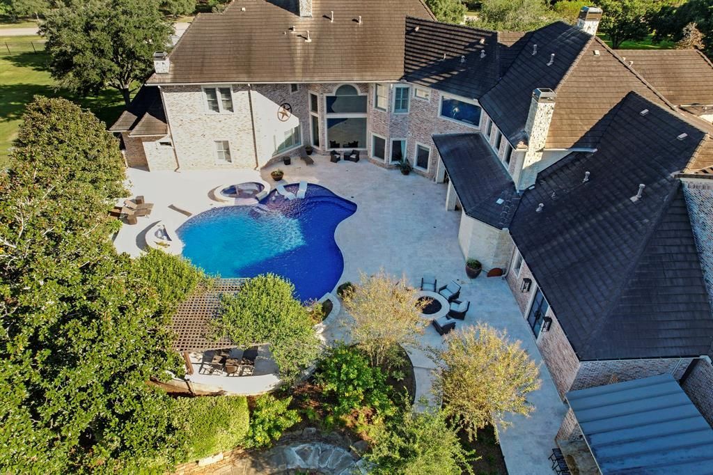 Acreage lifestyle meets city convenience in fresnos exquisite home listed at 3. 499 million 48