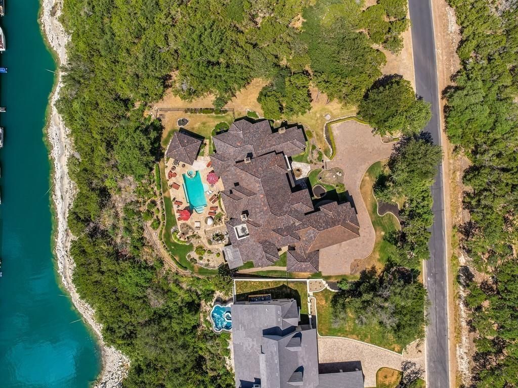 Breathtaking lake views a stunning home in jonestown offered at 3. 49 million 33