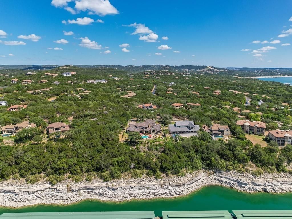 Breathtaking lake views a stunning home in jonestown offered at 3. 49 million 34