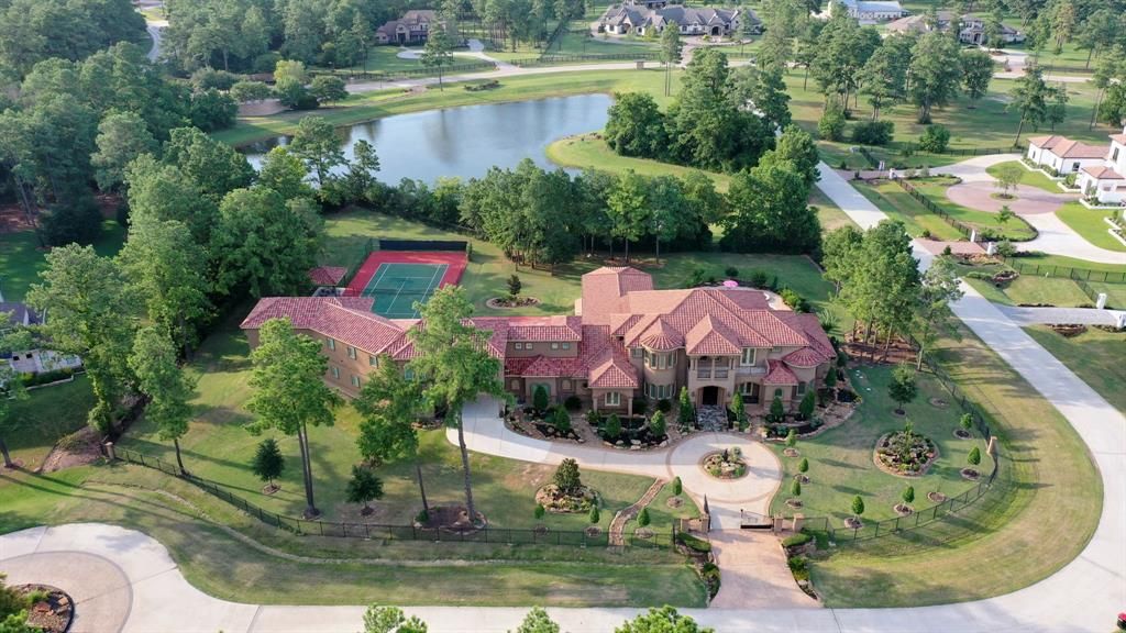 Secluded splendor in tomball grand masterpiece on a lakefront corner lot for 3. 395 million 1