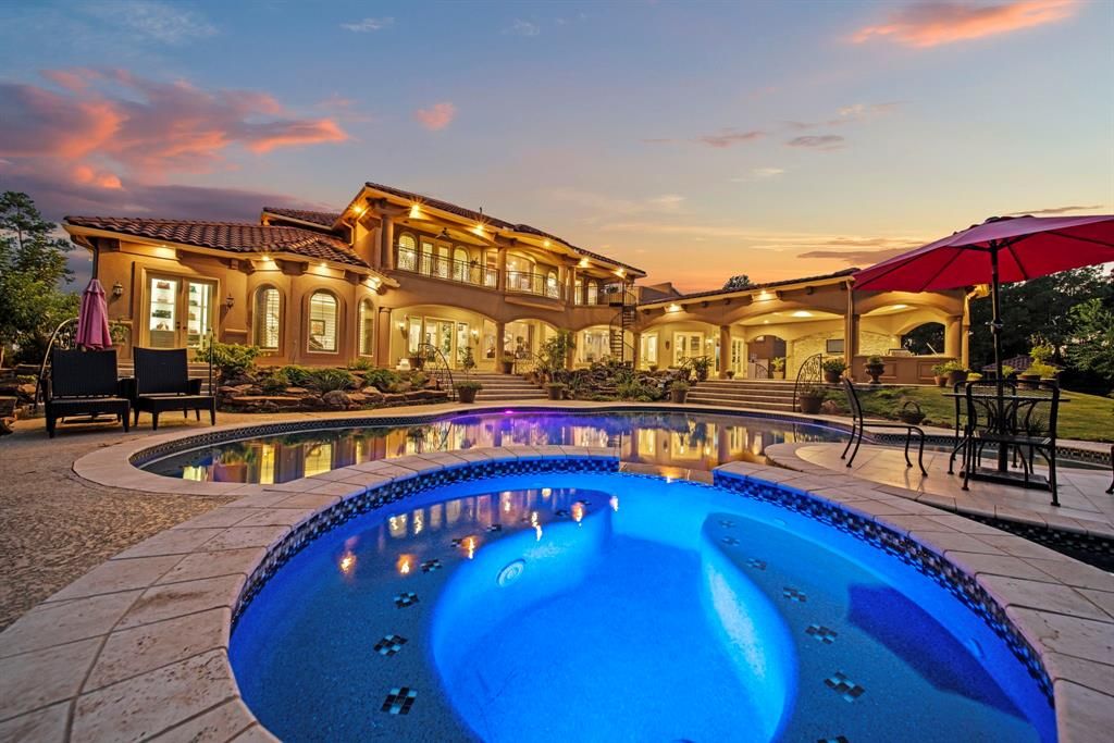 Secluded Splendor in Tomball: Grand Masterpiece on a Lakefront Corner Lot for $3.395 Million