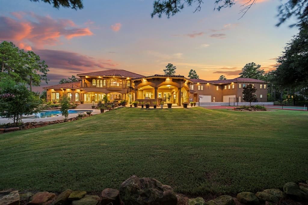 Secluded splendor in tomball grand masterpiece on a lakefront corner lot for 3. 395 million 4